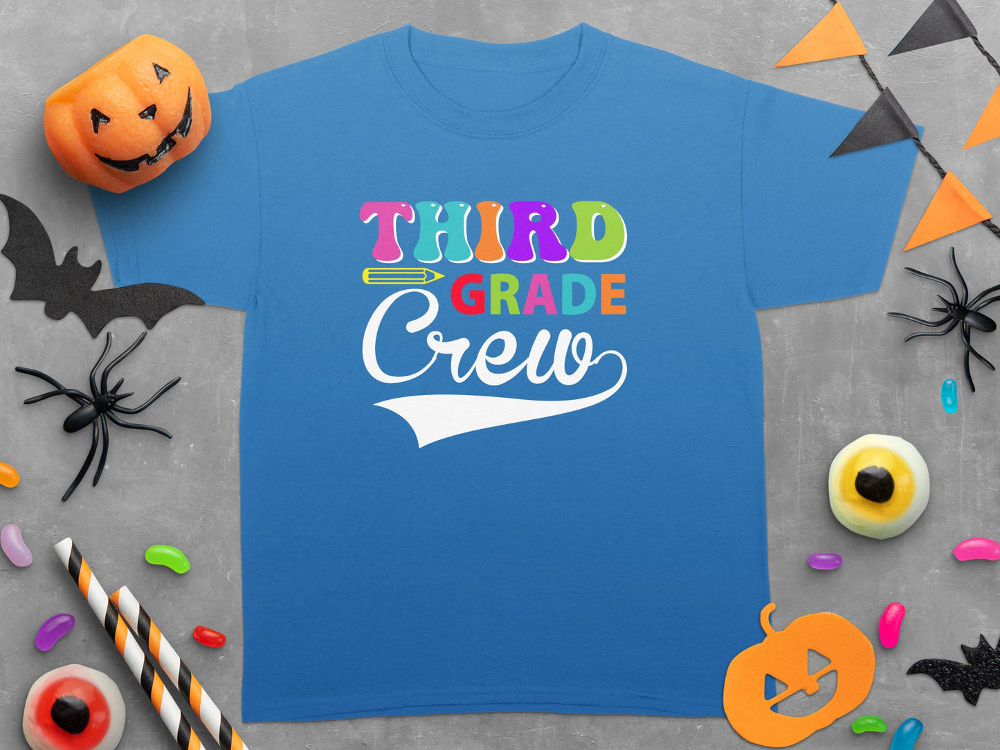 Blue t-shirt with "Third Grade Crew" text and Halloween decorations.