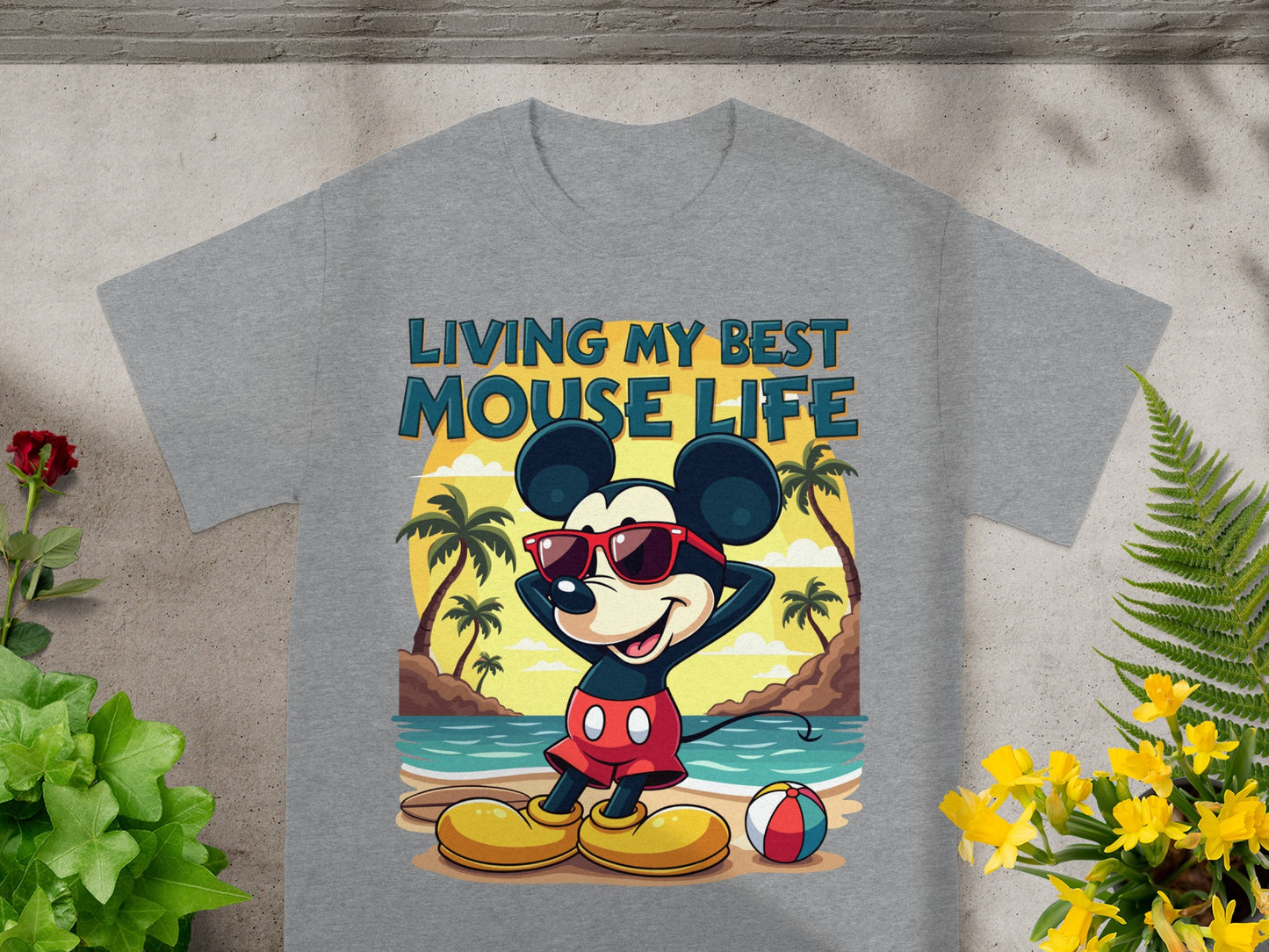 Mickey Mouse wearing sunglasses on a beach with the text "LIVING MY BEST MOUSE LIFE".