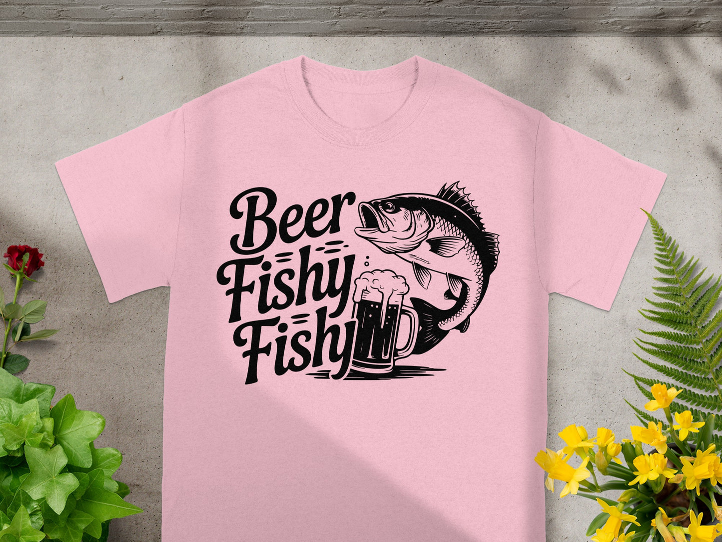 Pink t-shirt with black text and illustration of fish and beer.