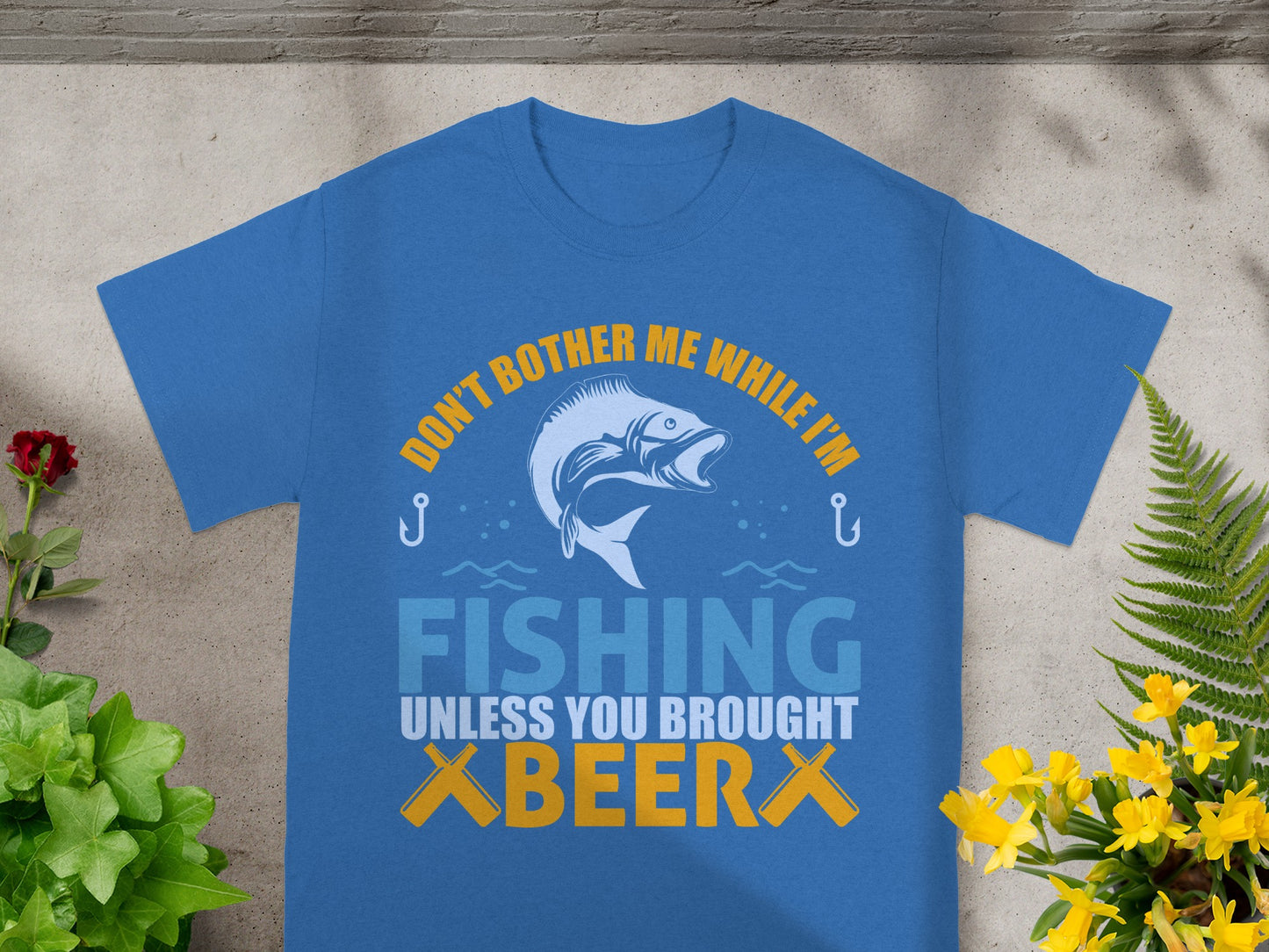 Blue t-shirt with "Don't Bother Me While I'm Fishing, Unless You Brought Beer".