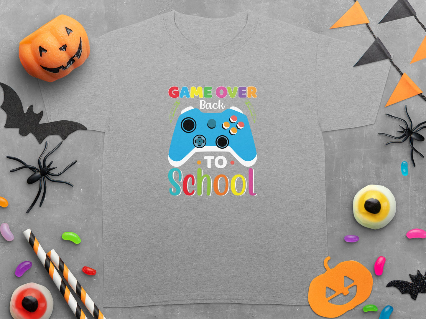 Grey t-shirt with "GAME OVER Back TO School" graphic featuring a blue video game controller.