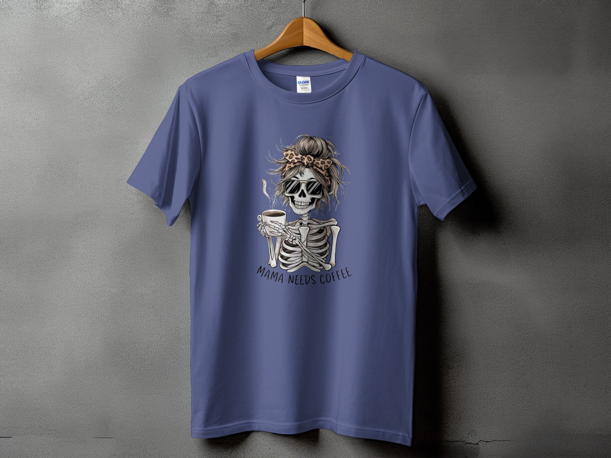 Skeleton with sunglasses and messy bun holding coffee cup, text "Mama Needs Coffee".