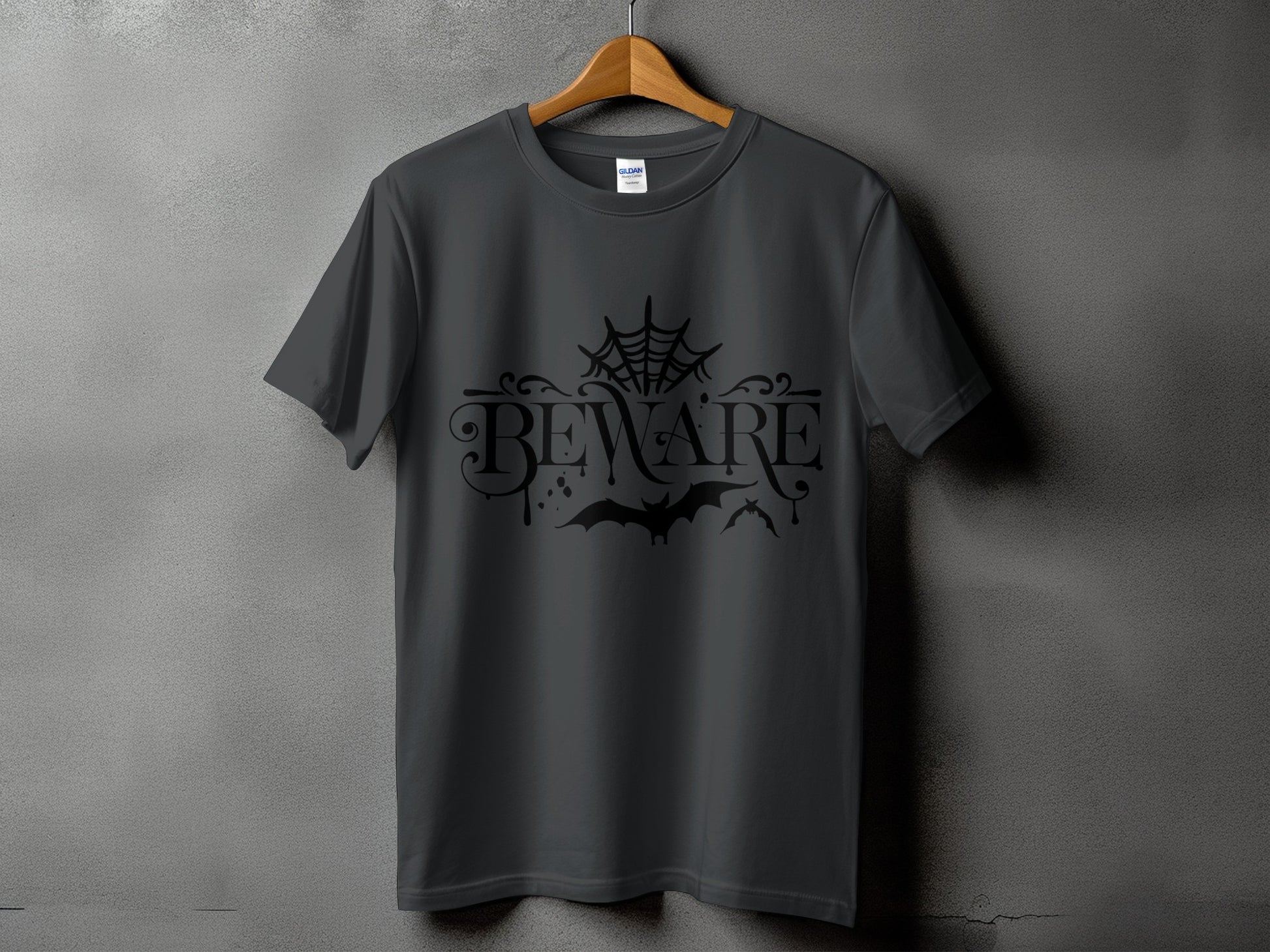 Dark gray t-shirt with black "BEWARE" text, bats, and spider web graphic.
