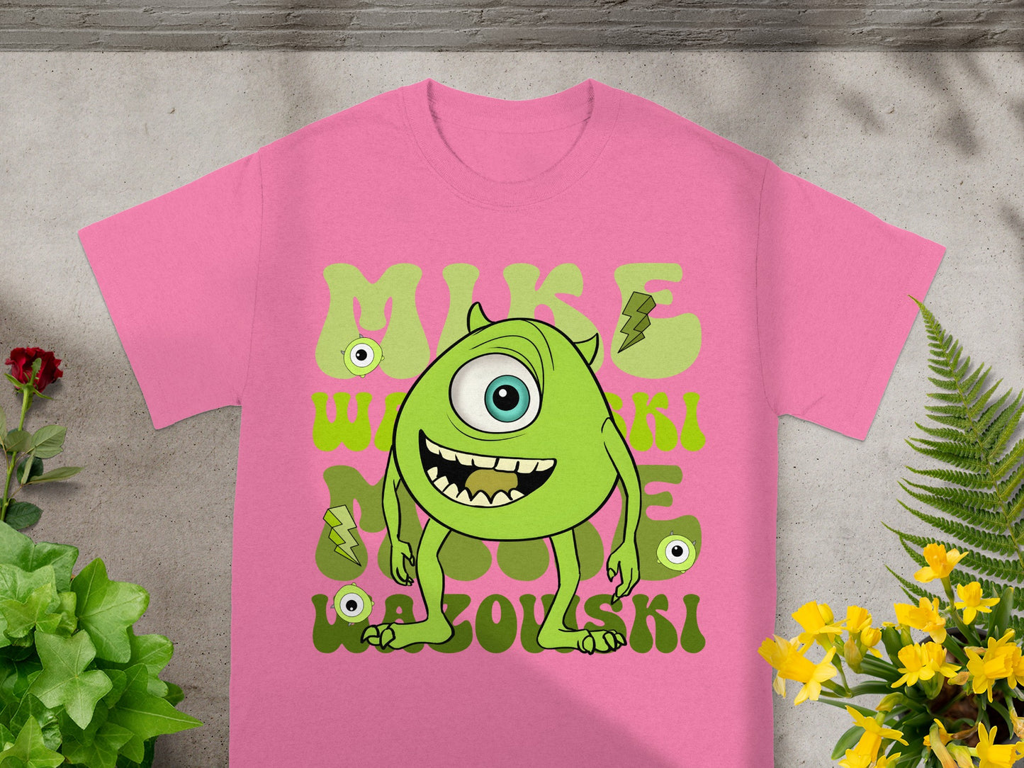 Pink t-shirt with cartoon Mike Wazowski from Monsters Inc.