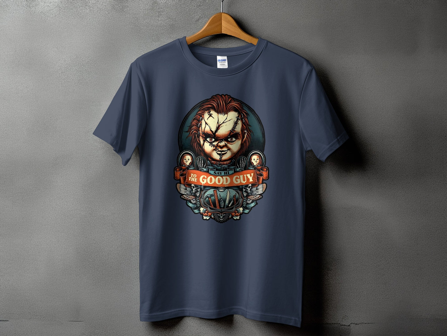 Dark navy t-shirt with Chucky's face and "Say Hi to the Good Guy" text.