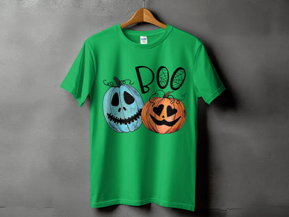 Green t-shirt with "Boo" text and cartoon pumpkins with Halloween faces.