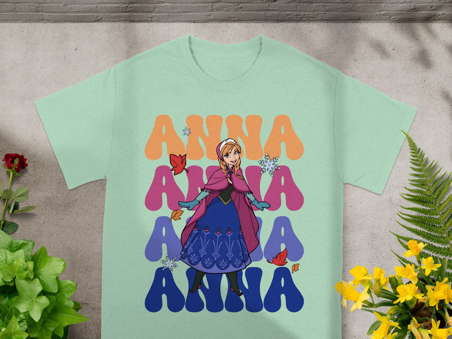 Light mint t-shirt with Anna from Frozen graphics and text.