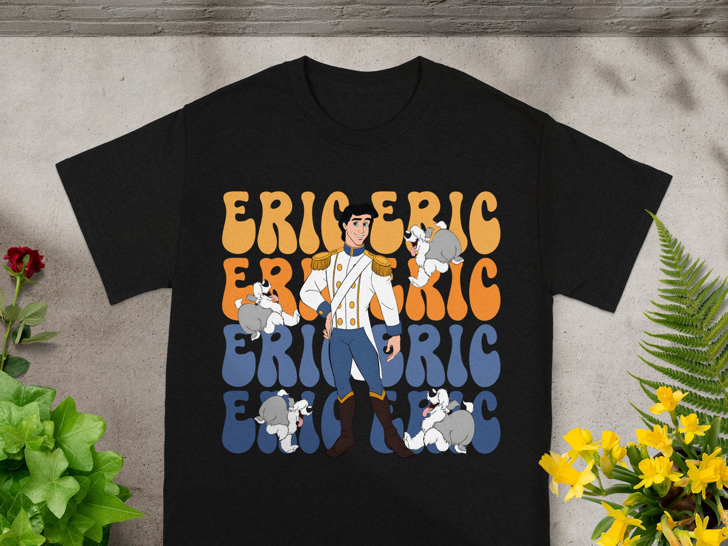 Black t-shirt with Prince Eric and dogs graphic.