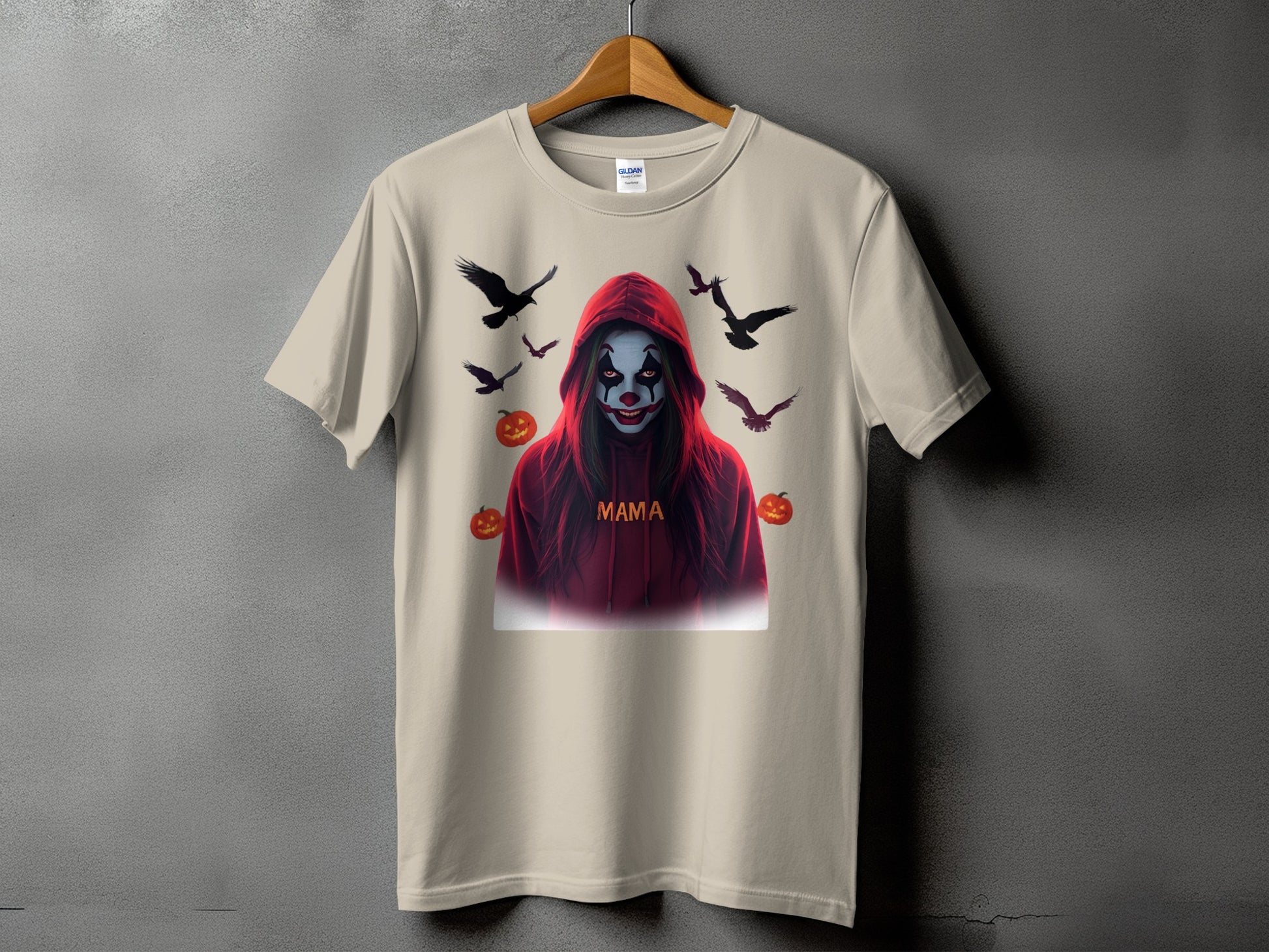 T-shirt with Halloween clown, birds, and pumpkins graphic.