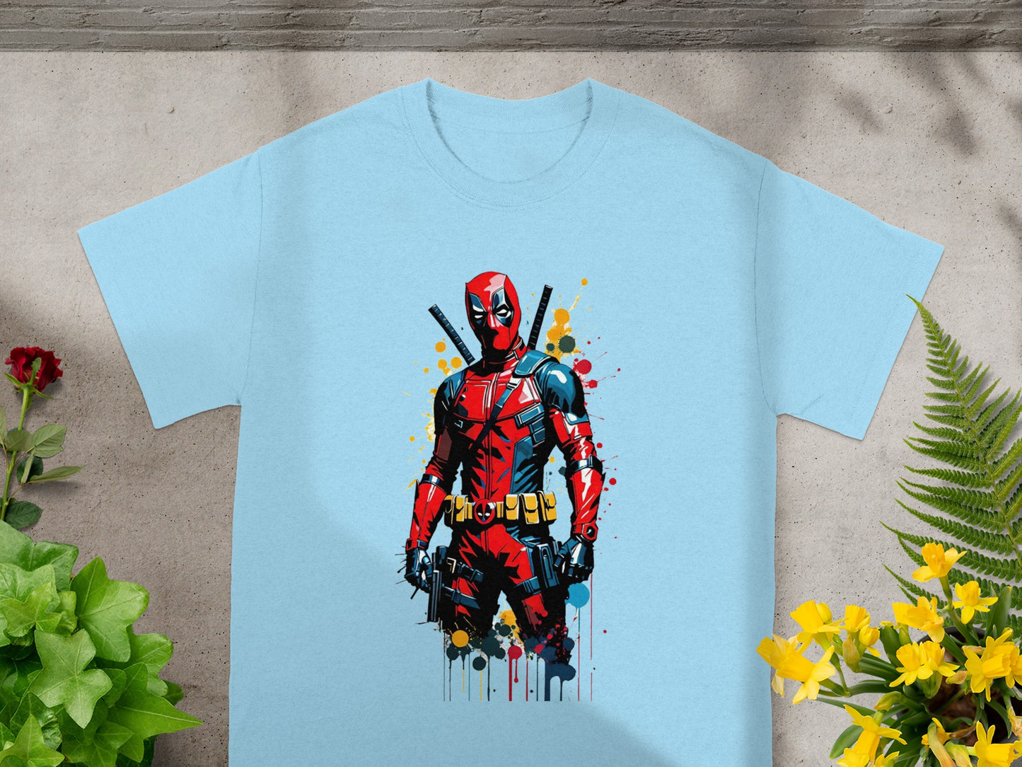 Light blue t-shirt with Deadpool character graphic.