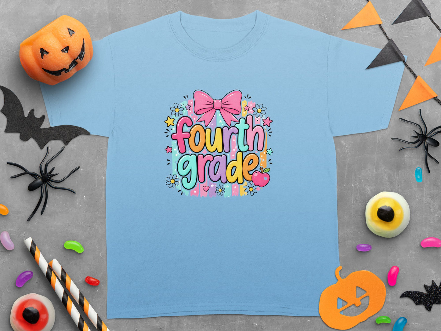 Light blue t-shirt with "fourth grade" text and Halloween decorations.