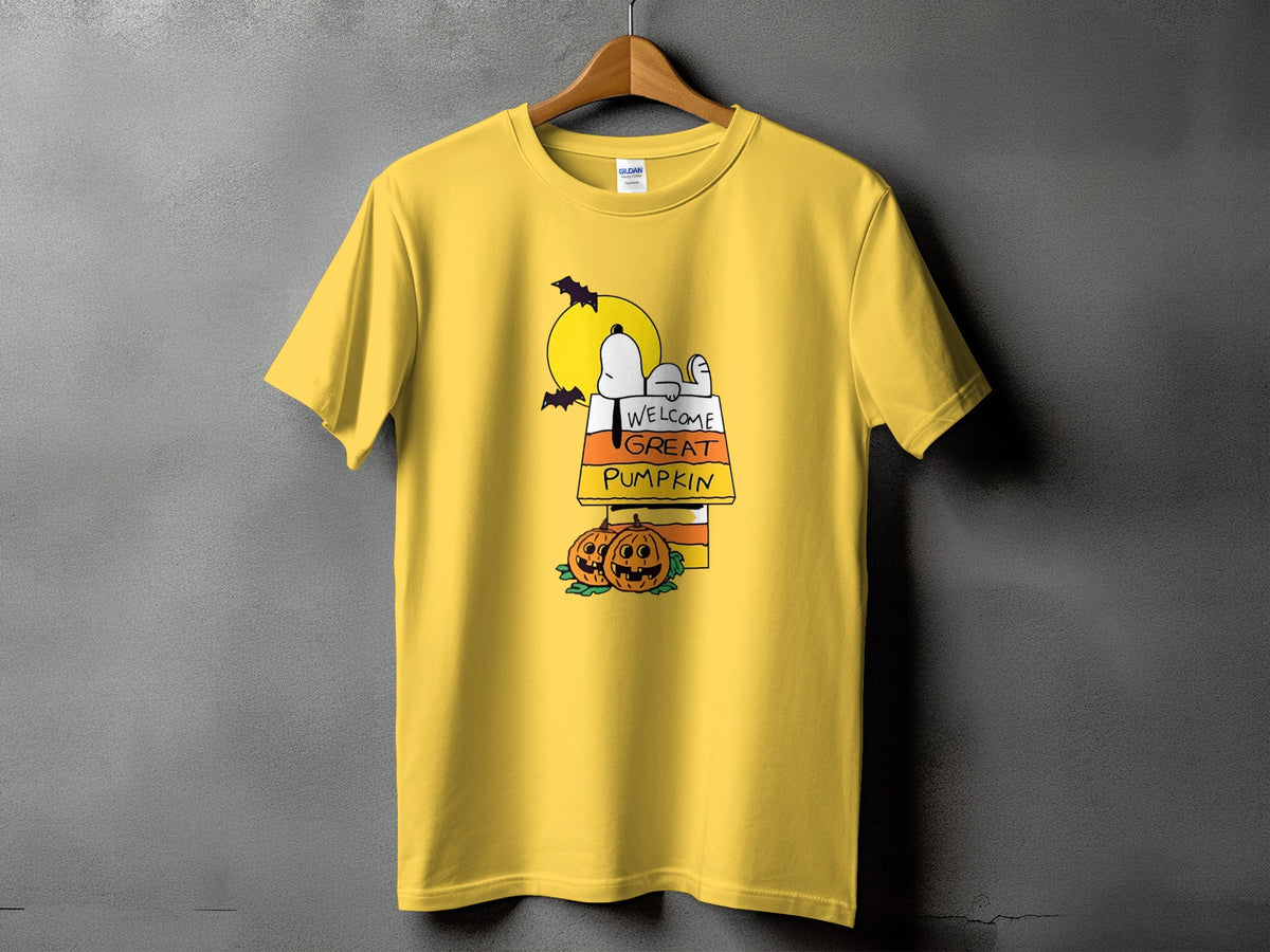Yellow t-shirt with Snoopy lying in a candy corn pumpkin patch, "Welcome Great Pumpkin" text.