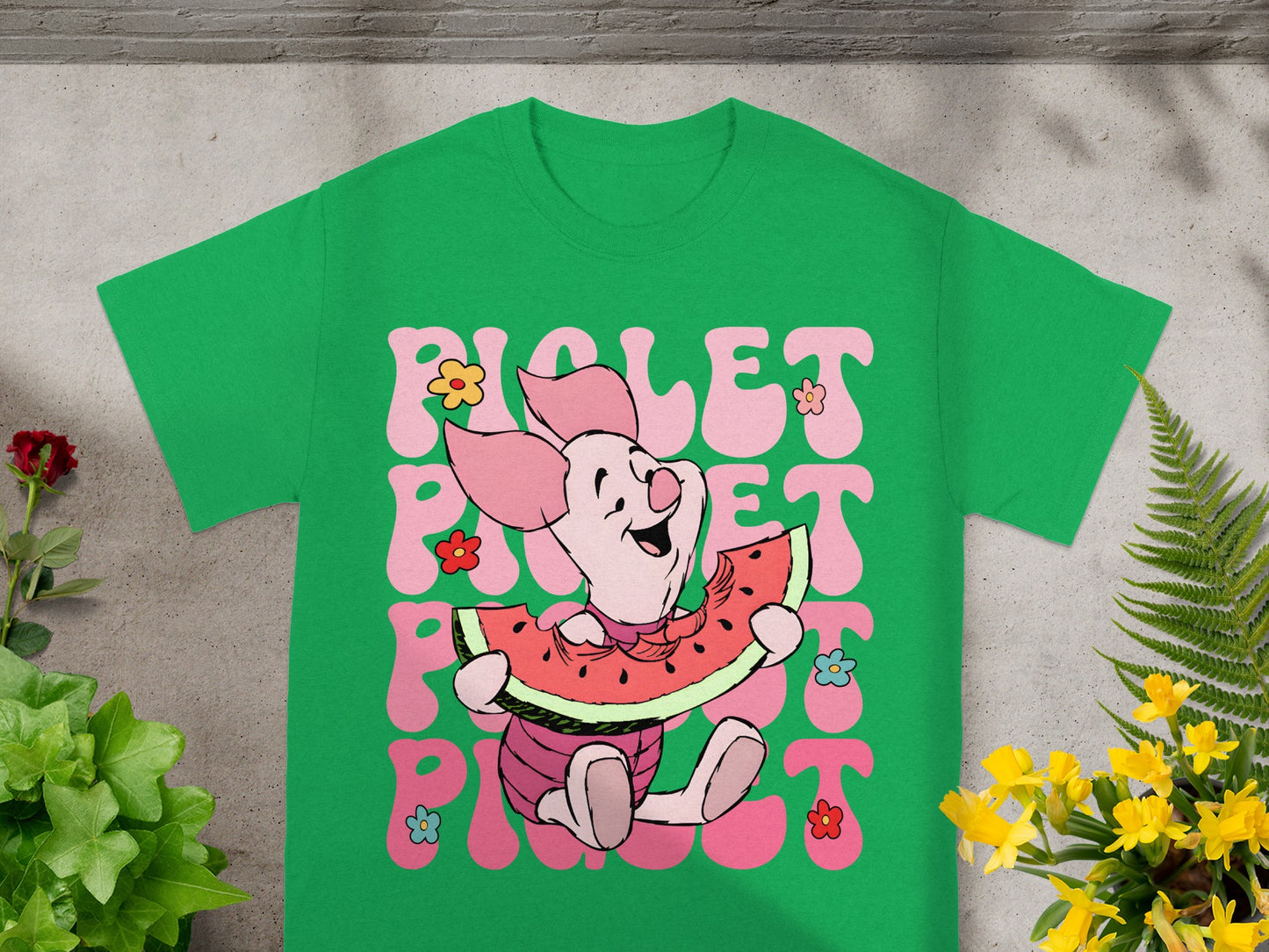 Piglet sitting, eating watermelon, with "Piglet" text in retro font.