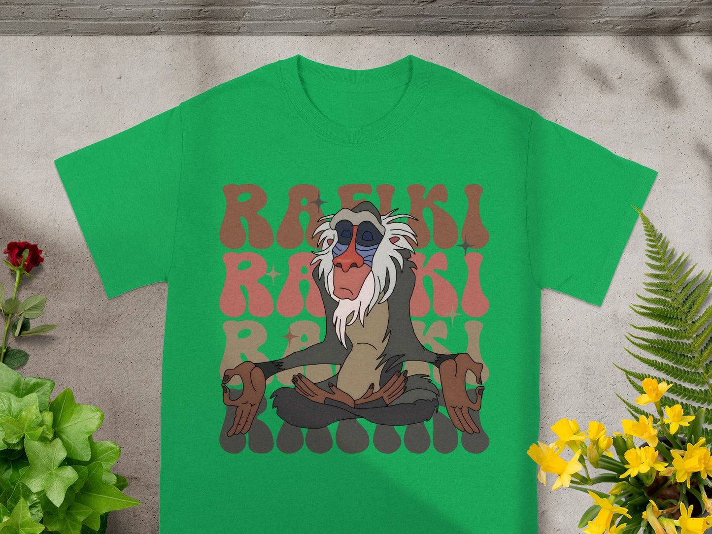 Green t-shirt with Rafiki meditating and "Rafiki" text.