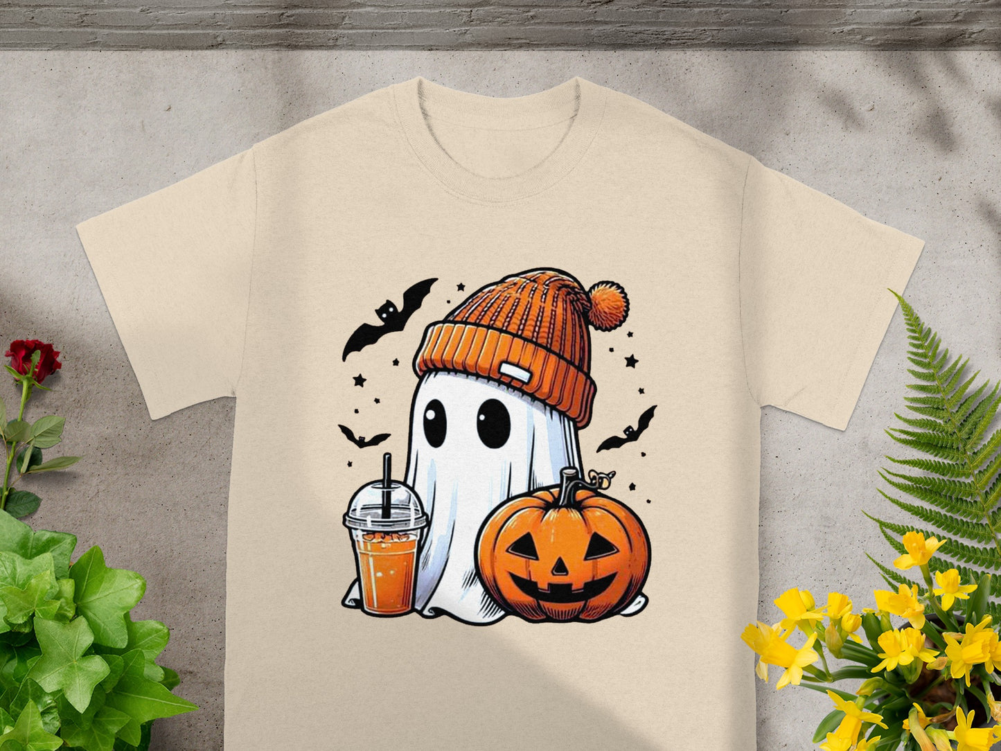 Ghost in beanie with pumpkin and drink, surrounded by bats and stars.