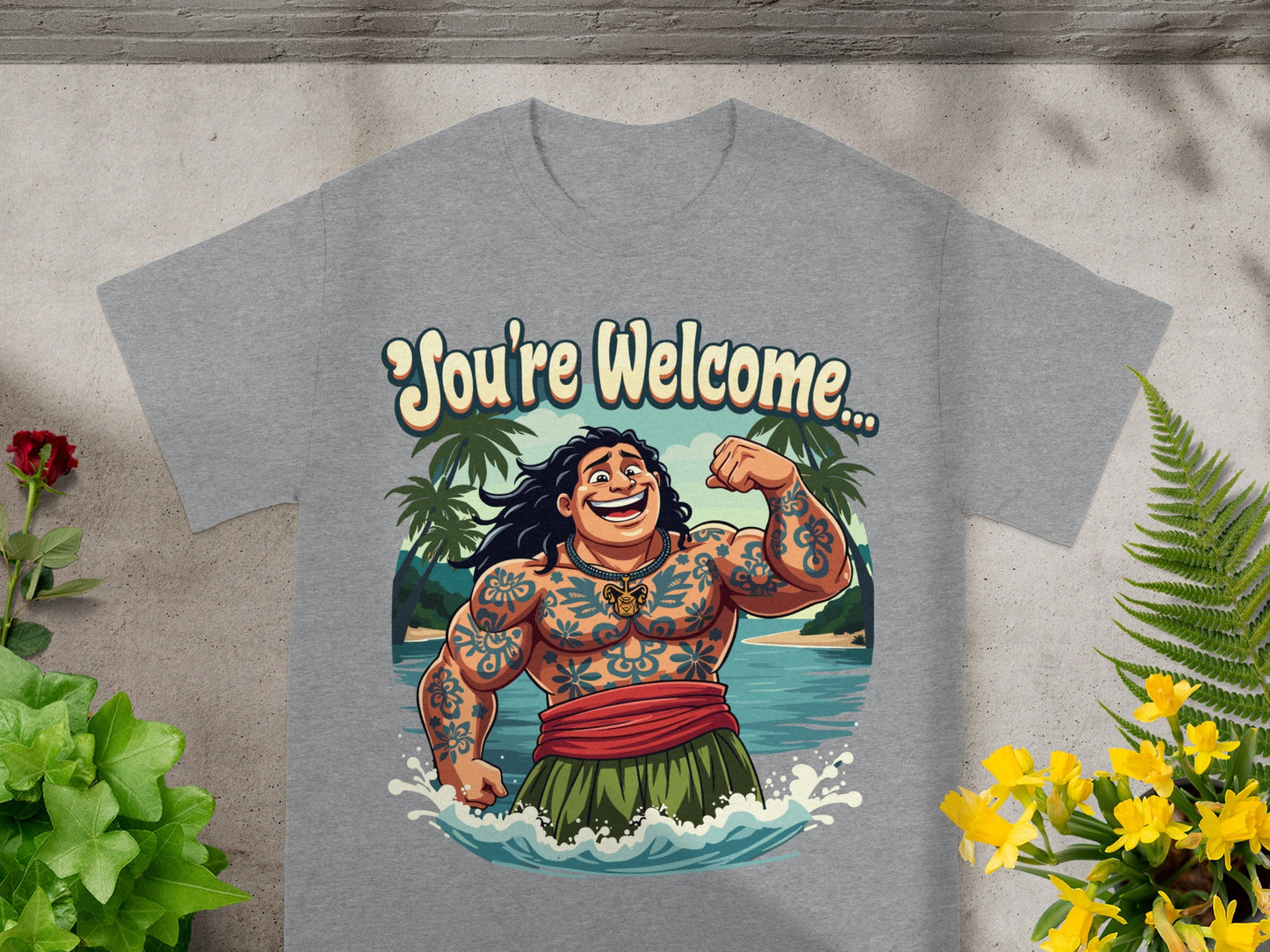 Tattooed buff man in grass skirt with "You're Welcome..." text over tropical background.