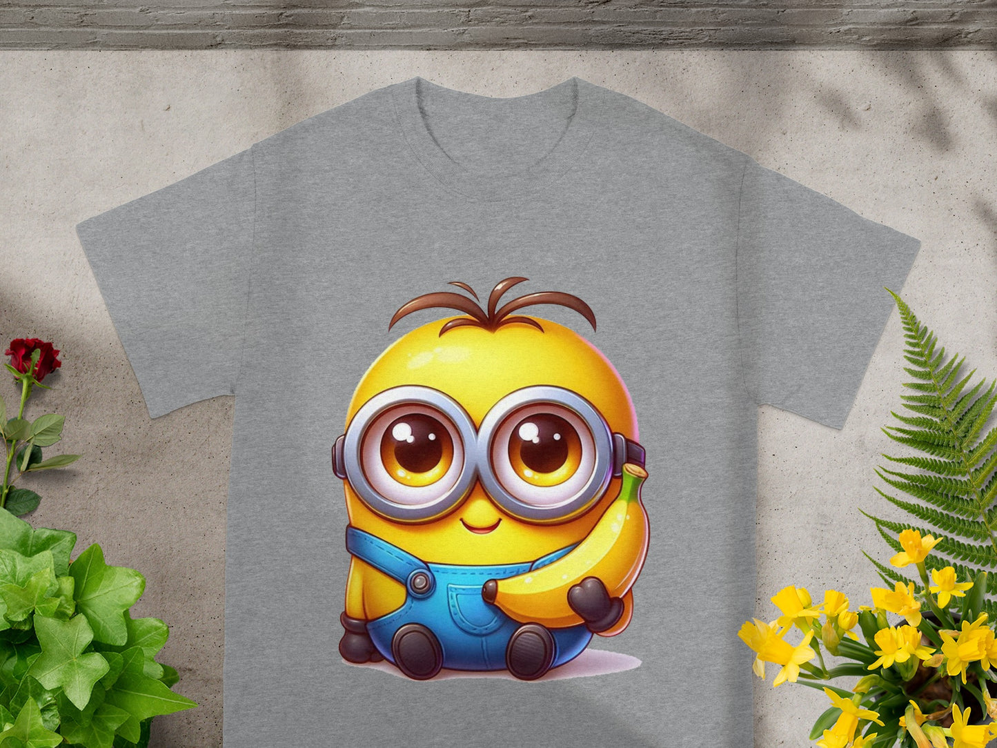 Gray t-shirt with a Minion character holding a banana.
