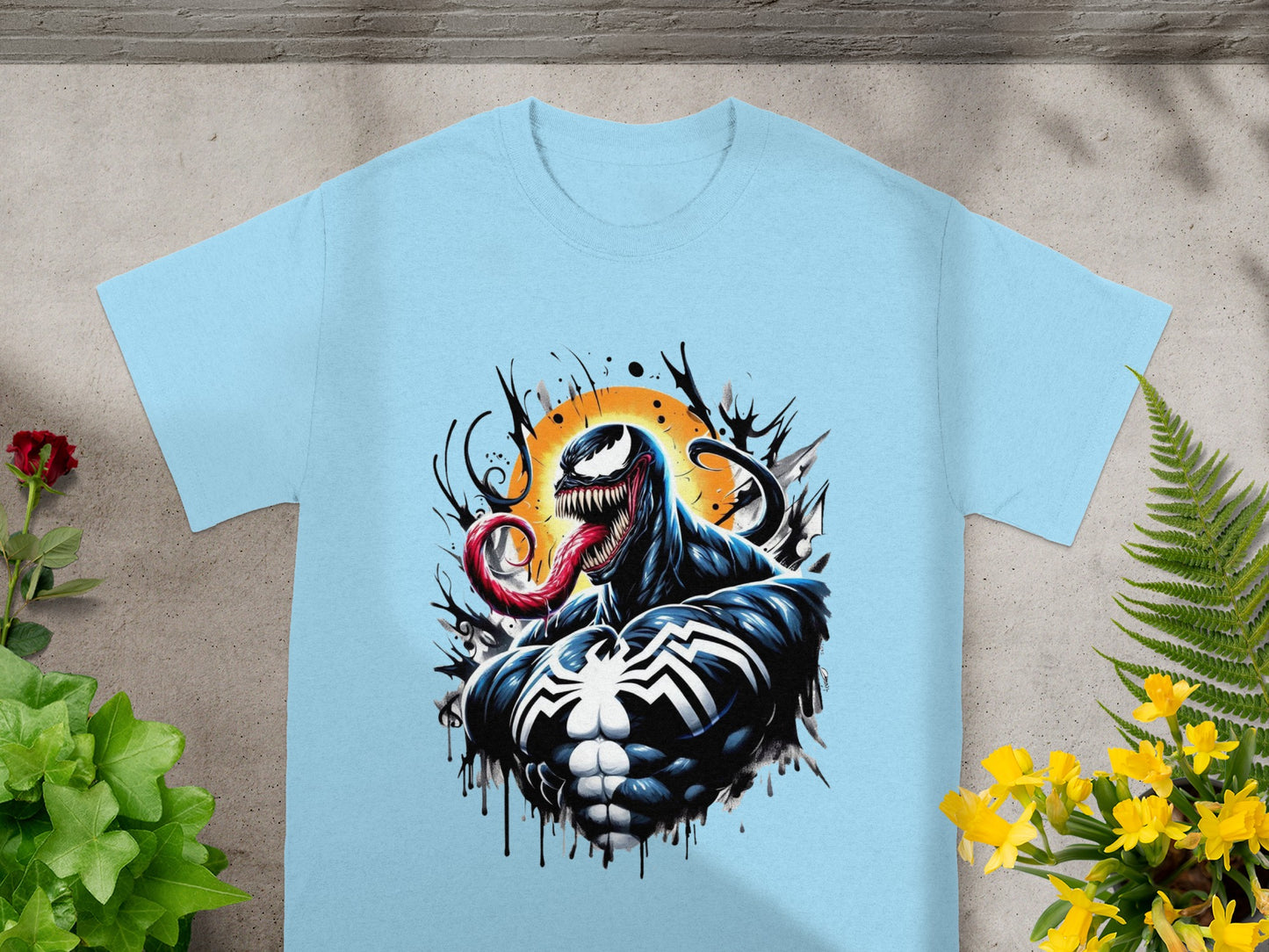 Light blue t-shirt featuring Venom bursting from a sun graphic.