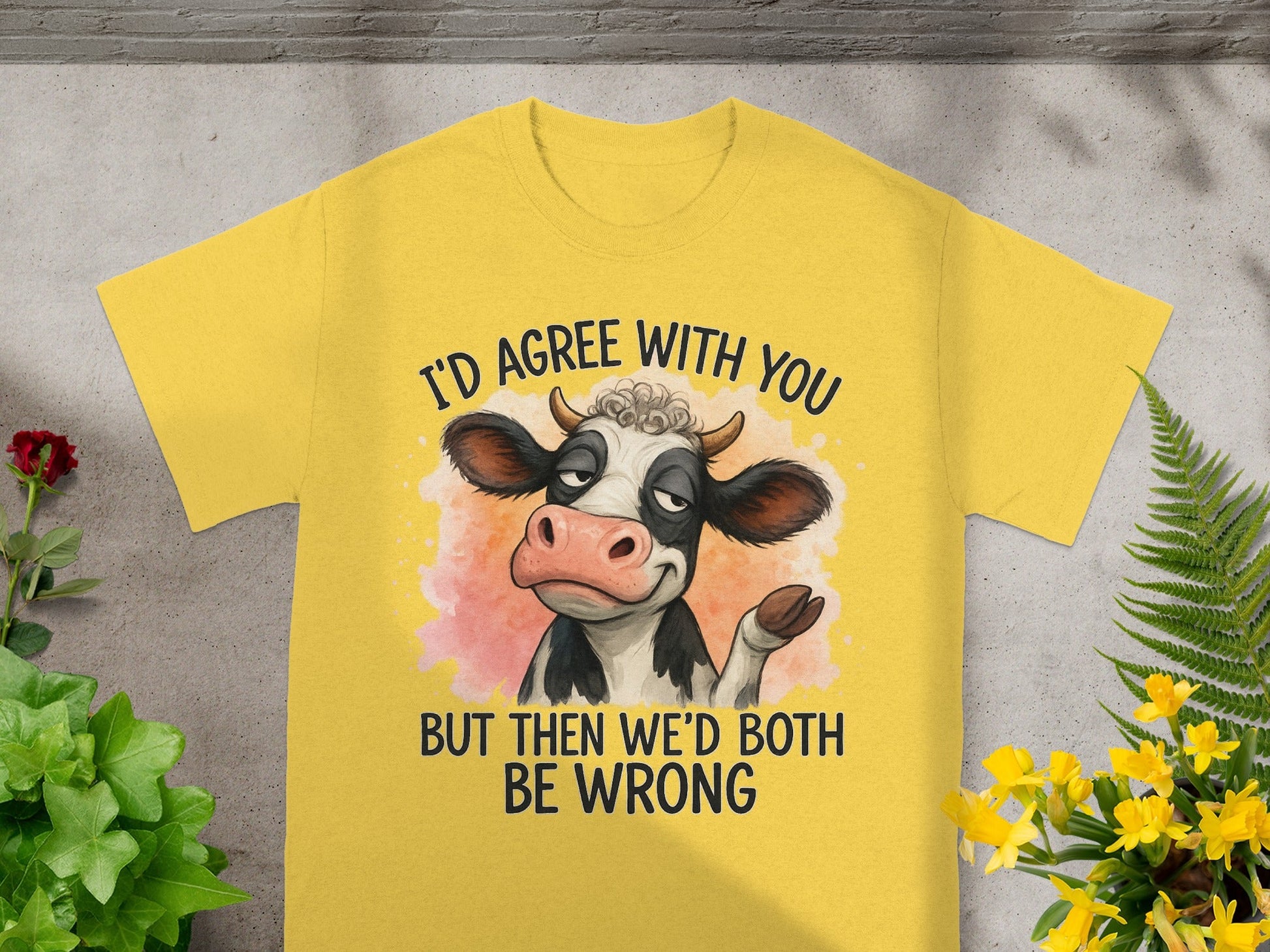 Yellow t-shirt with cartoon cow saying "I'd agree with you but then we'd both be wrong".