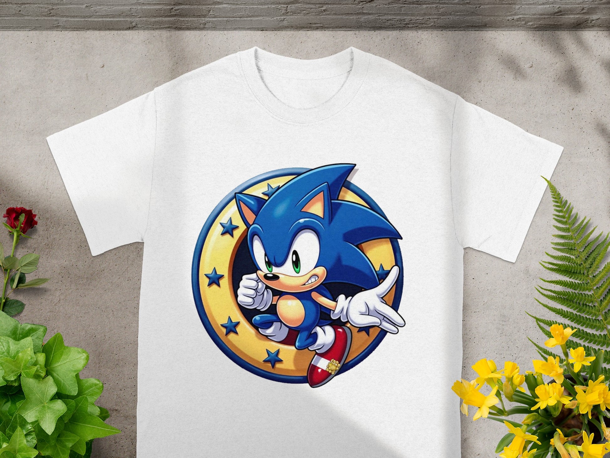 White t-shirt with Sonic the Hedgehog character logo and stars.