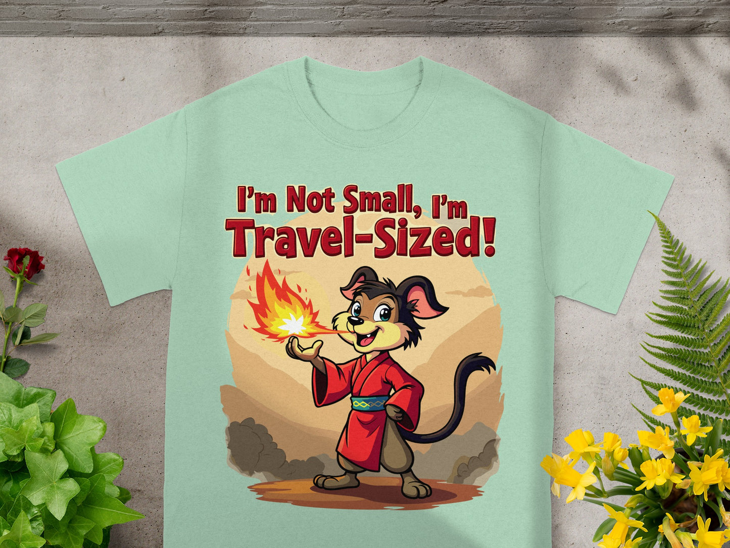 Cartoon dog in red robe breathing fire, text "I'm Not Small, I'm Travel-Sized!".