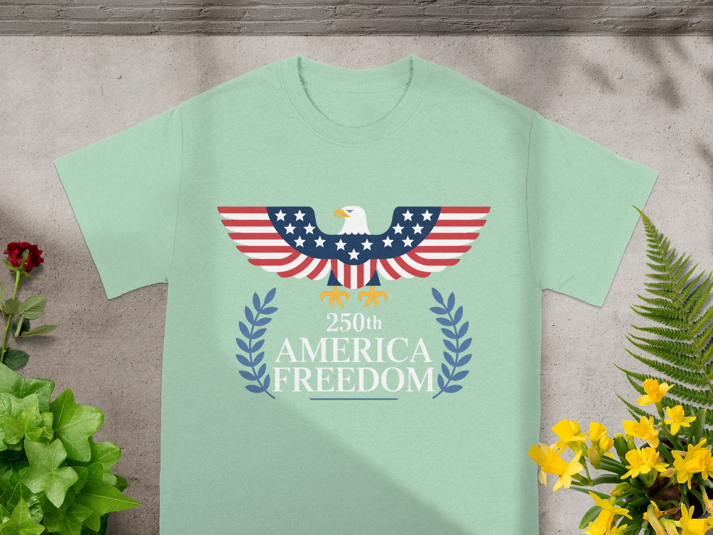 Pale green t-shirt with eagle, US flag wings, and "250th America Freedom" text.
