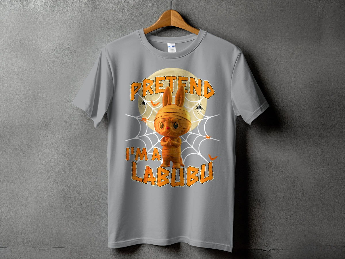 Grey t-shirt with mummy Labubu character and text "PRETEND I'M A LABUBU".
