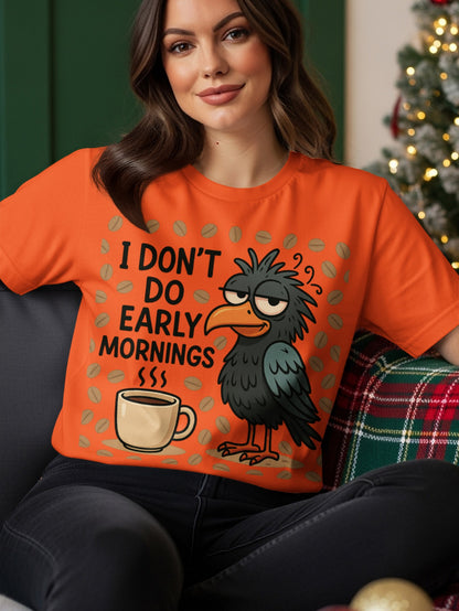Orange t-shirt with a raven and coffee, reading "I don't do early mornings."