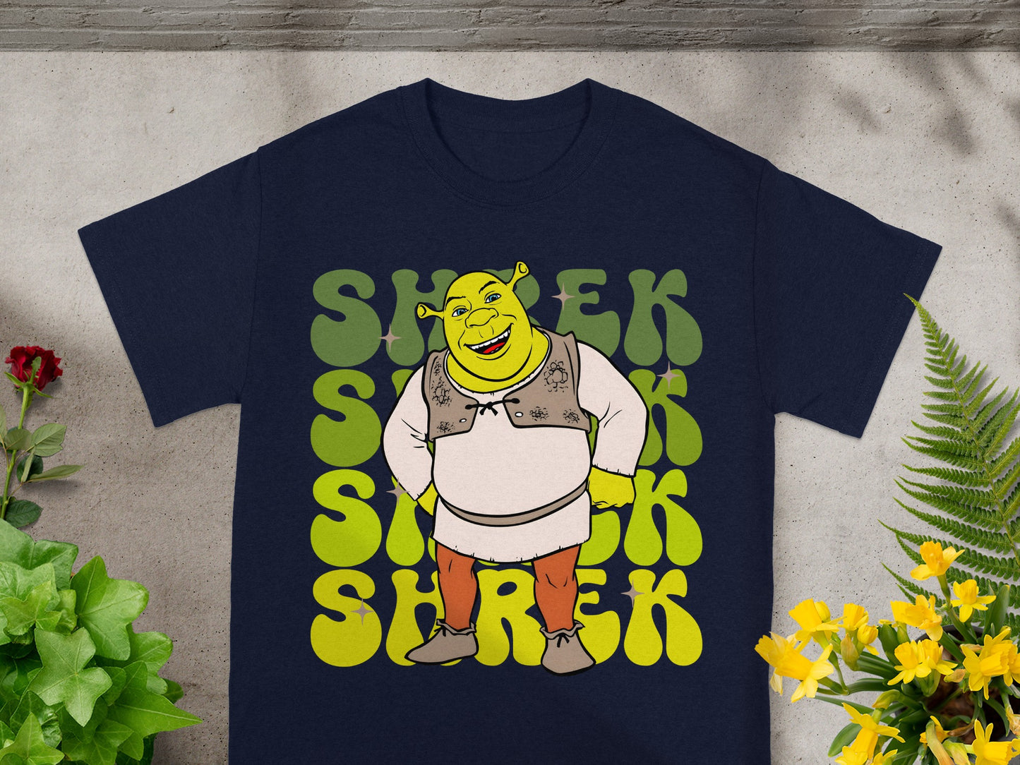 Navy t-shirt with Shrek graphic and green retro text.