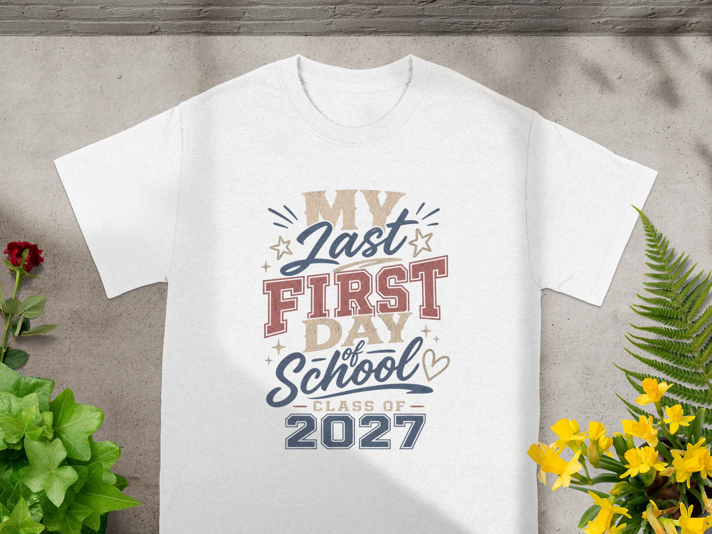 White t-shirt with "My Last First Day of School Class of 2027" graphic.