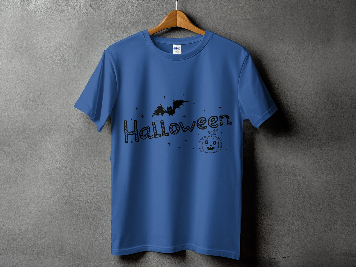 Blue t-shirt with black Halloween text, bat, and pumpkin graphic.