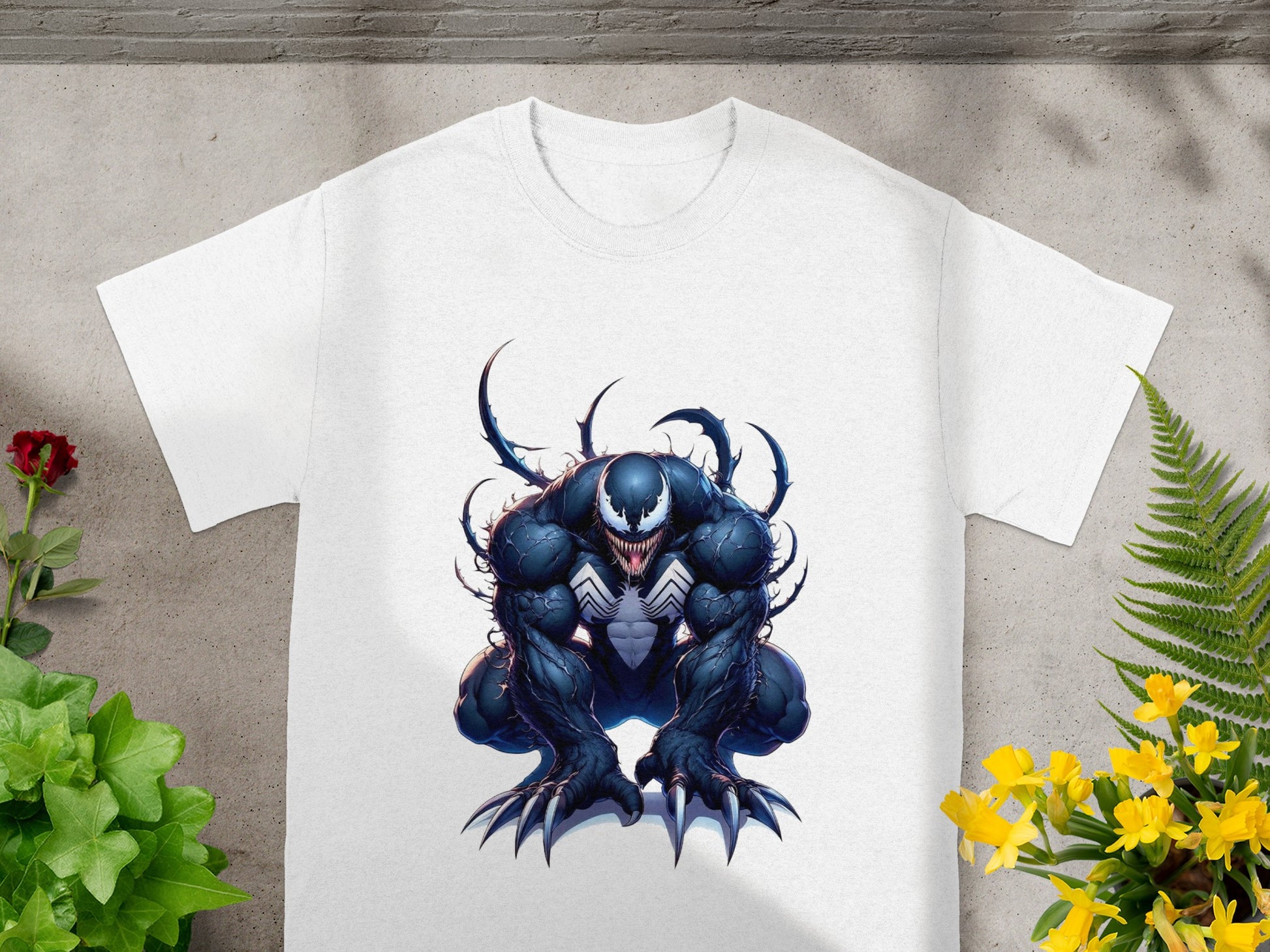 White t-shirt with Venom character artwork.