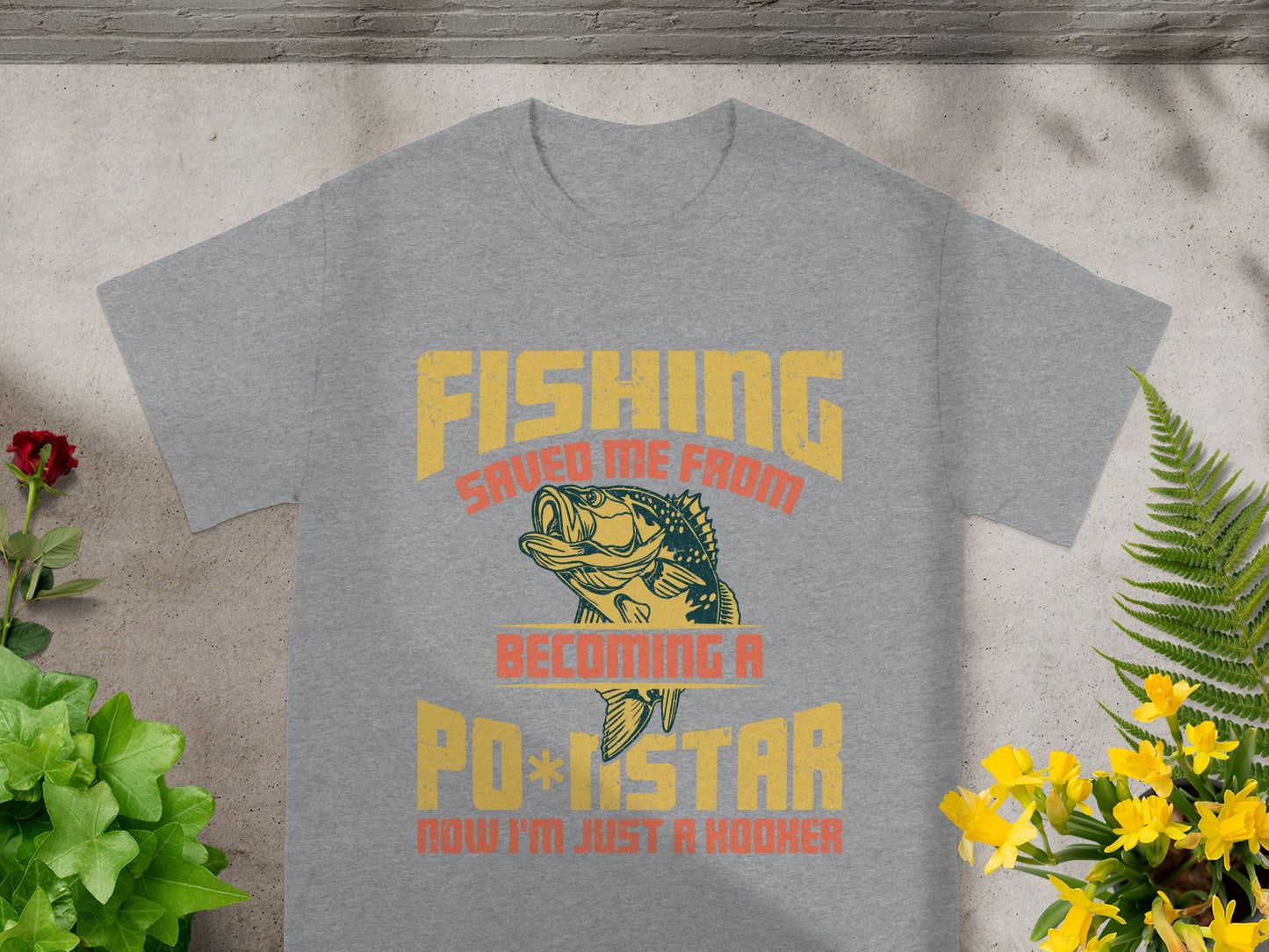 Grey t-shirt with graphic "Fishing Saved Me From Becoming A Pop Star Now I'm Just a Hooker".