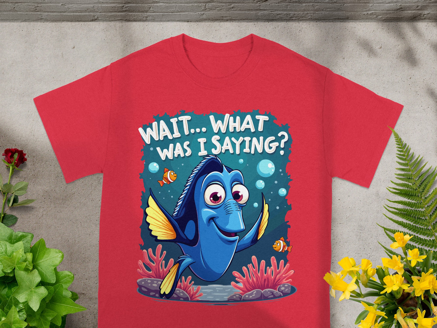 Dory from Finding Nemo asking "WAIT... WHAT WAS I SAYING?" on a red t-shirt.