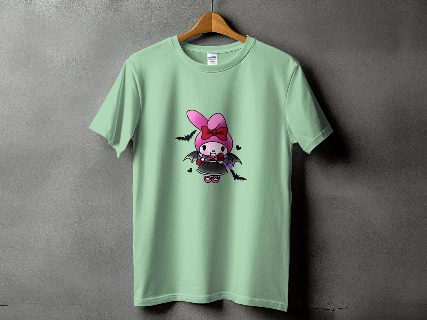 Mint green t-shirt with a cute vampire bunny graphic and bats.