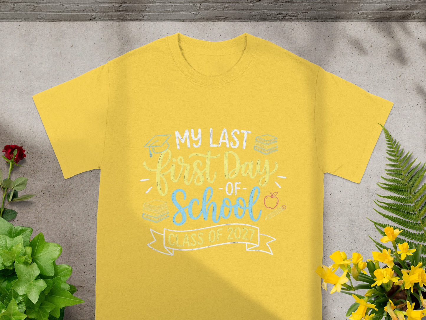 Yellow t-shirt with "My Last First Day - Of - School" and "Class of 2027" text.