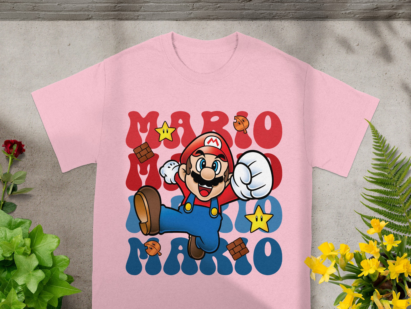 Pink t-shirt with Mario characters and "MARIO" text.