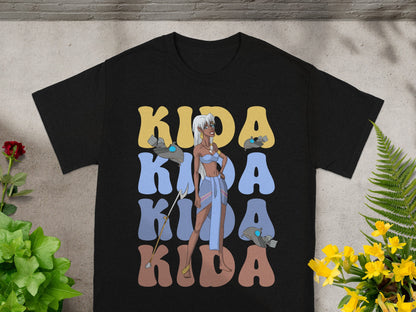 Black t-shirt with Kida's name repeated in stylized lettering.
