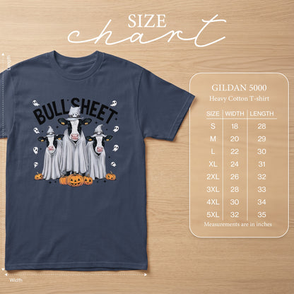 Dark blue t-shirt with "BULL SHEET" graphic featuring cows in ghost costumes and pumpkins. Size chart included.