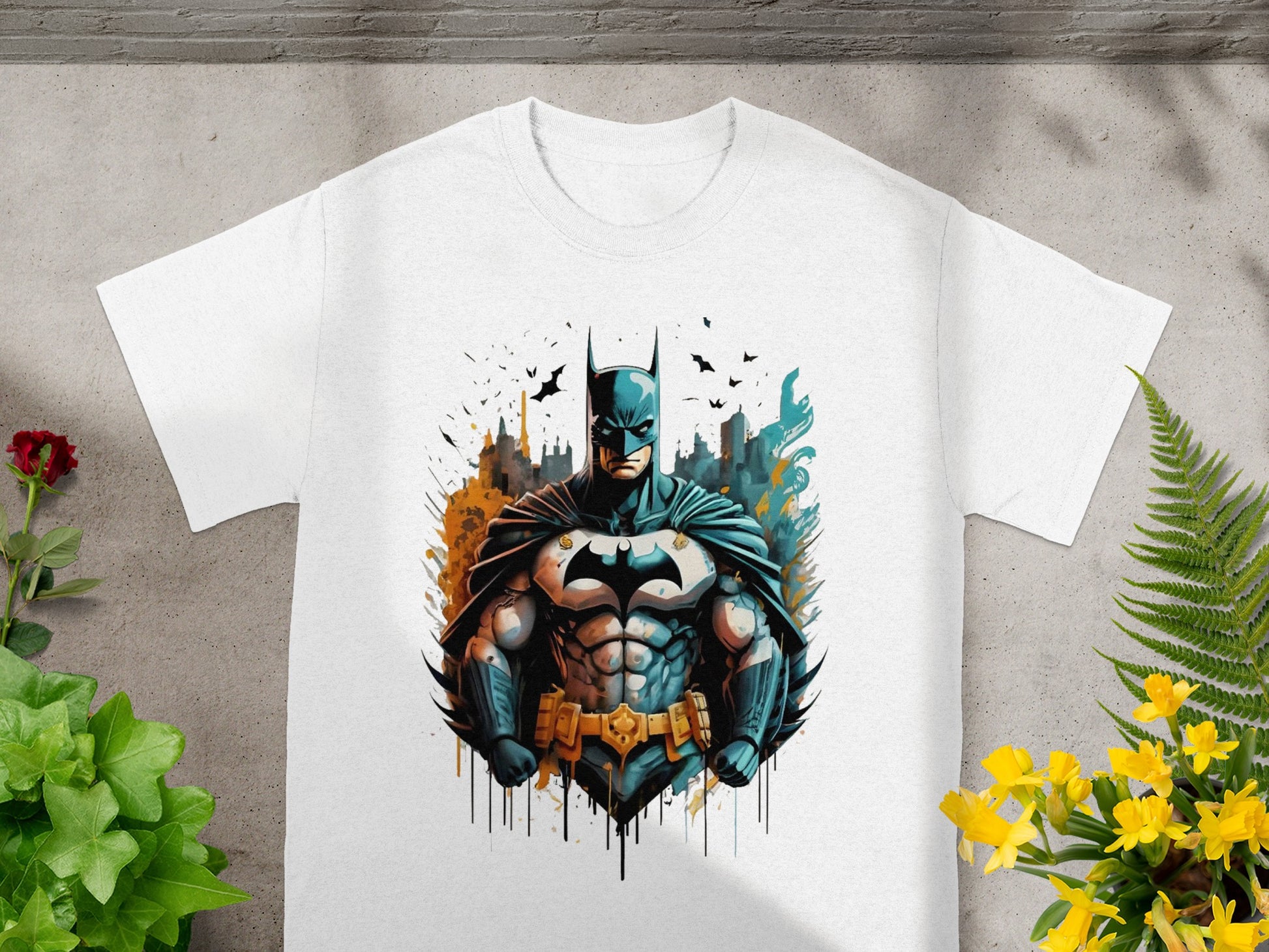 White t-shirt with a stylized Batman graphic in a city skyline.