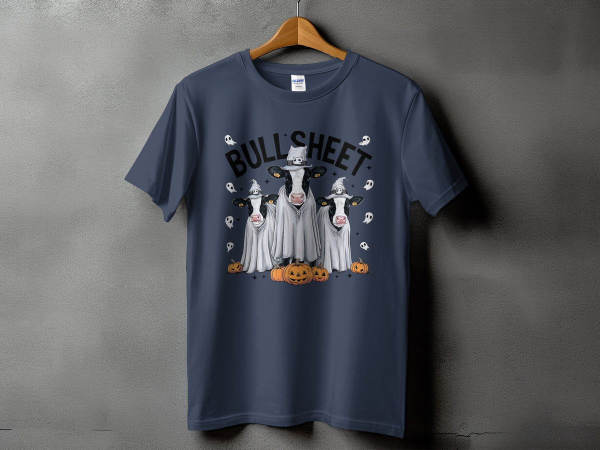 Three cows dressed as ghosts stand with pumpkins and ghosts, text reads "BULL SHEET".