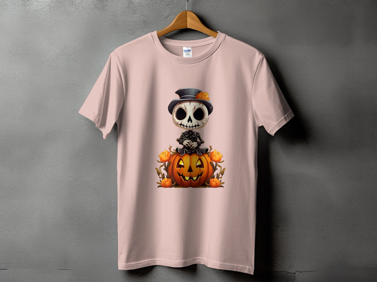 Pink t-shirt with a Halloween skeleton character on a pumpkin design.