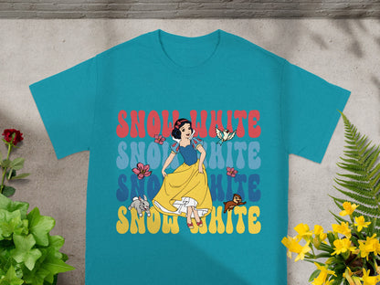 Teal t-shirt with "Snow White" text in red, white, and yellow, featuring Snow White character.