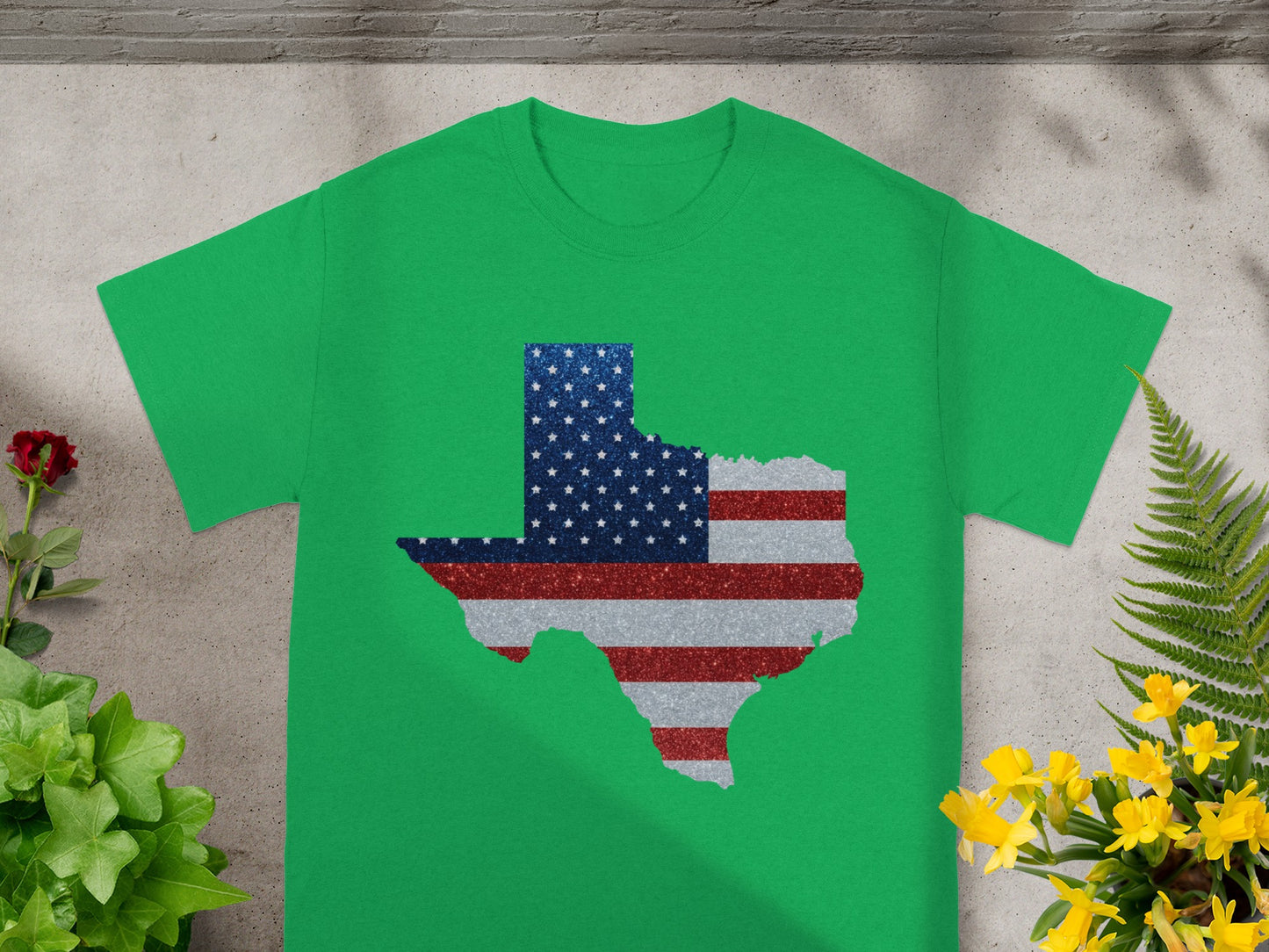 Green t-shirt with Texas map in American flag pattern.