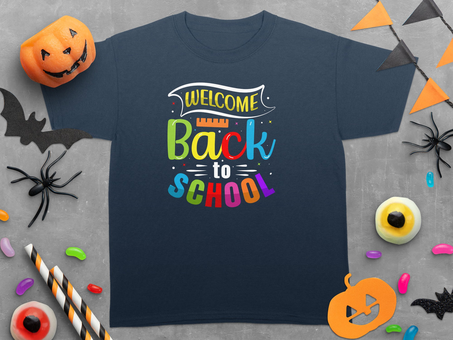 Dark blue t-shirt with "WELCOME Back to SCHOOL" in colorful block letters.