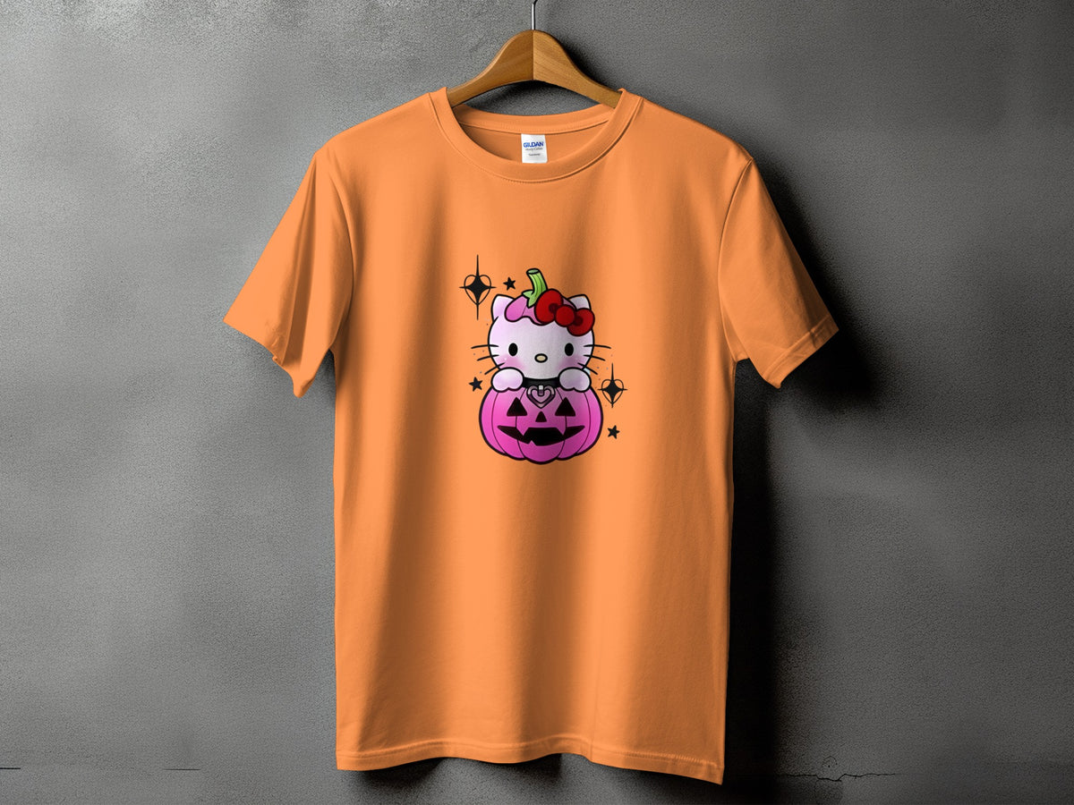 Orange t-shirt with Hello Kitty sitting in a pink pumpkin with a red bow.