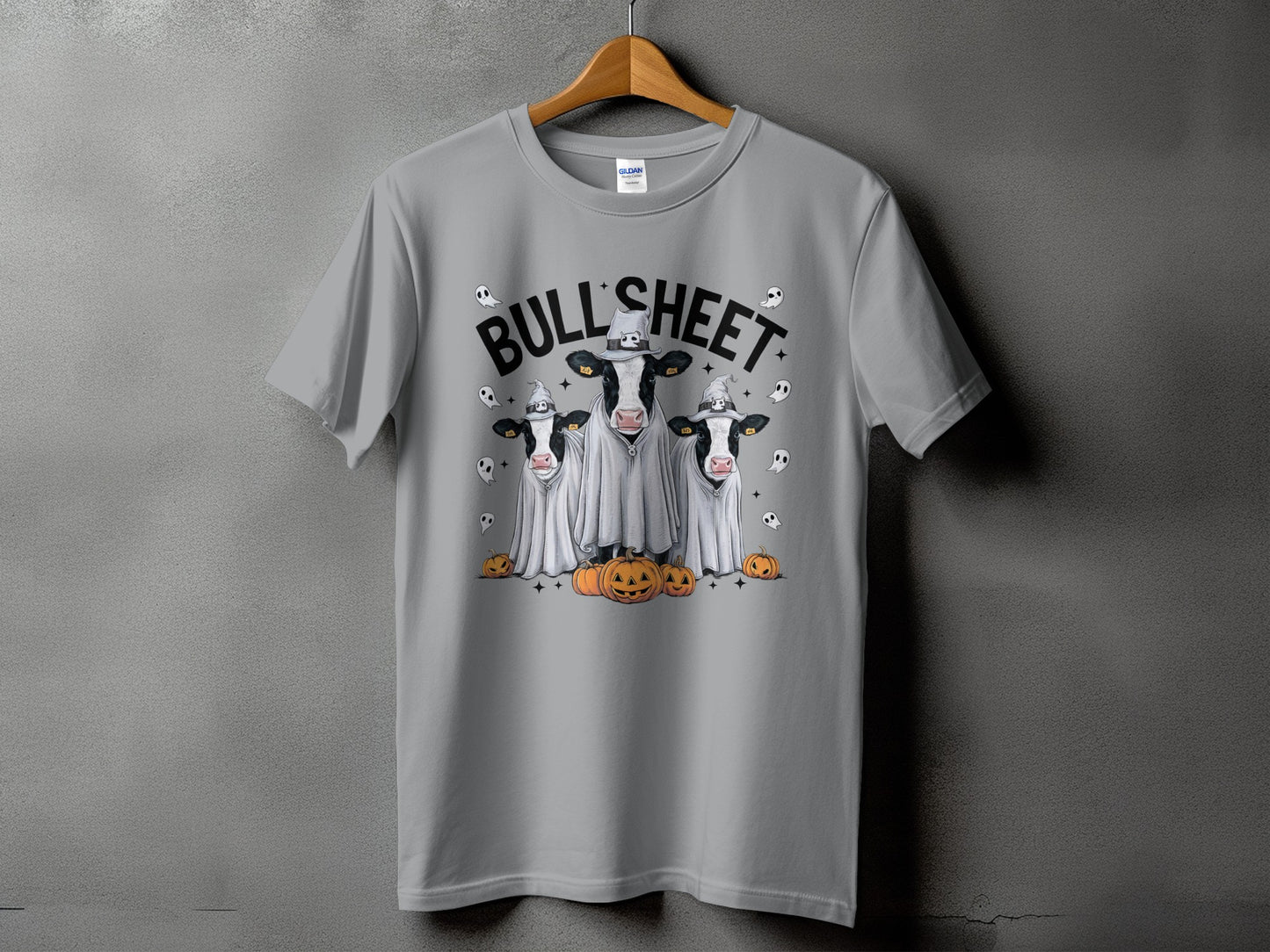 Gray t-shirt with three cows in ghost costumes and pumpkins.