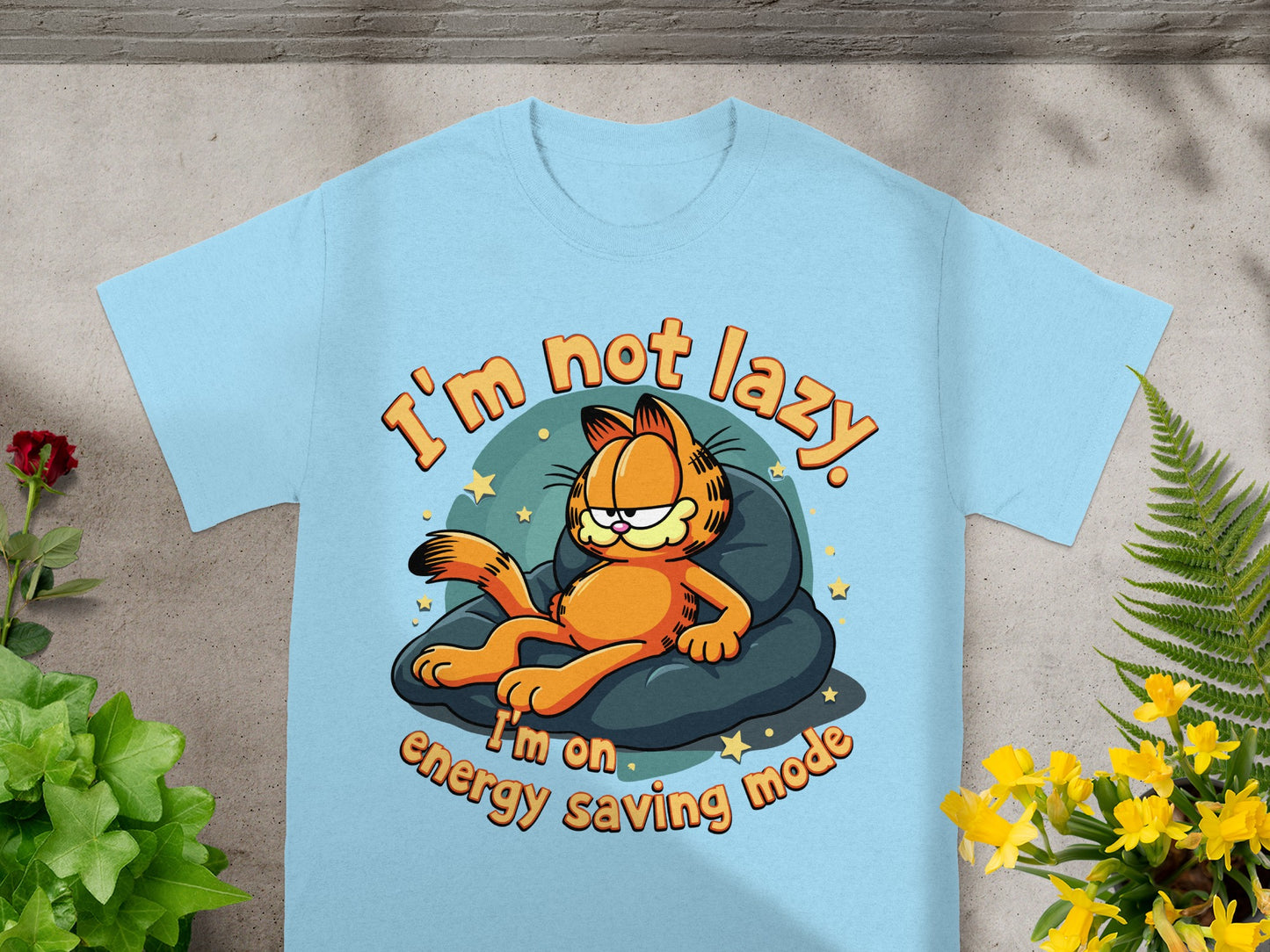 Light blue t-shirt with Garfield lying on a beanbag chair with text "I'm not lazy. I'm on energy saving mode."