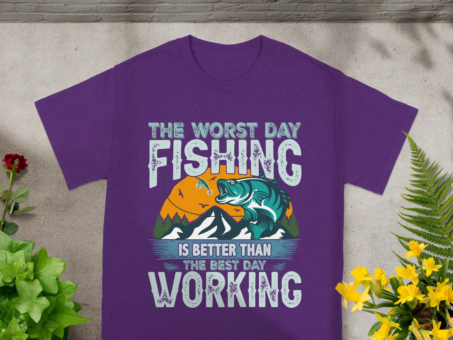 Purple t-shirt with "The Worst Day Fishing Is Better Than The Best Day Working" text and graphic.