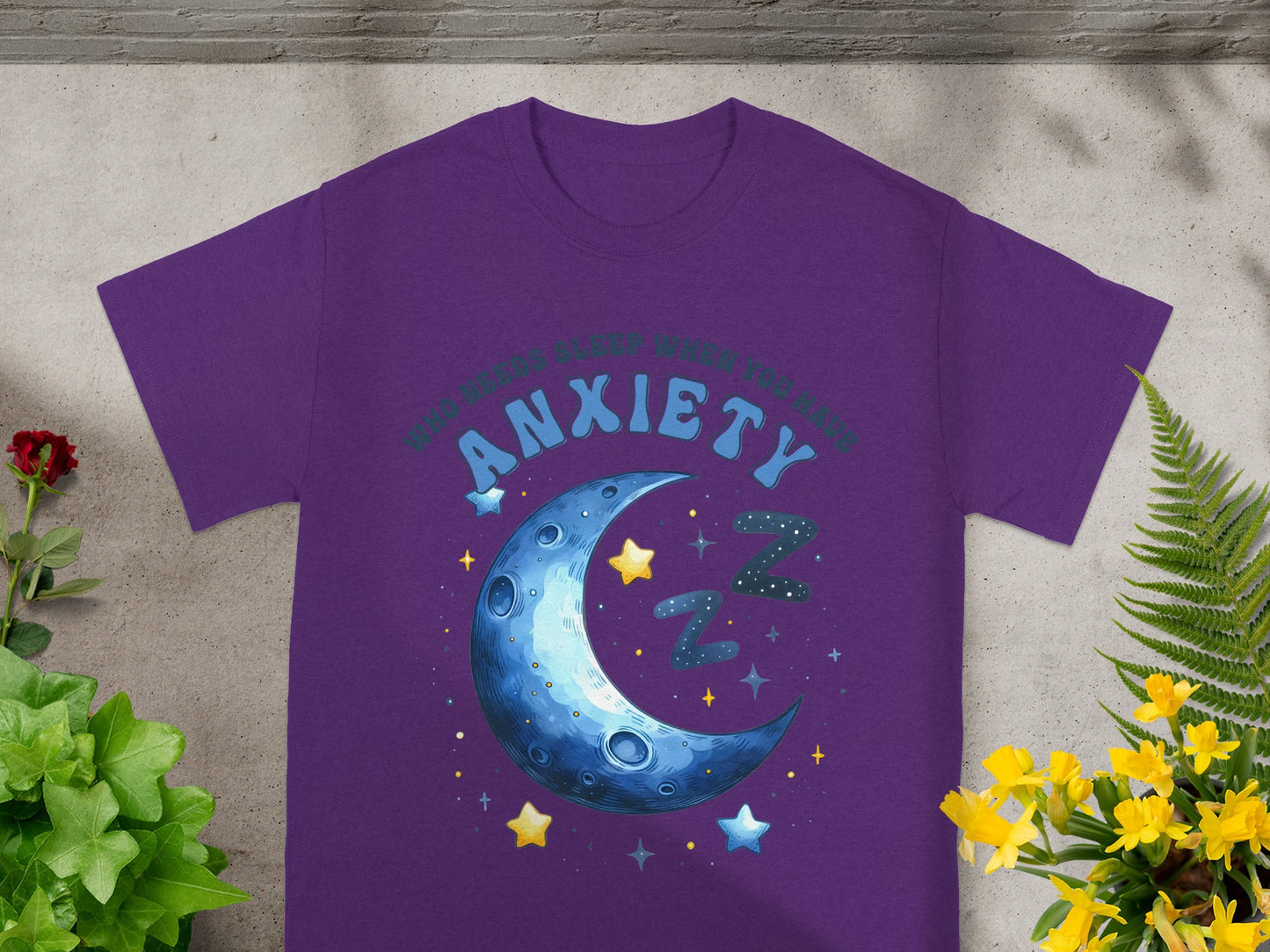 Purple t-shirt with "who needs sleep when you have anxiety" and moon graphic.